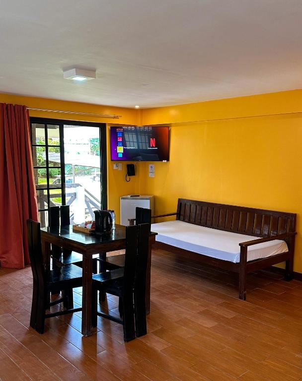 Postel nebo postele na pokoji v ubytování Piña Colina Resort