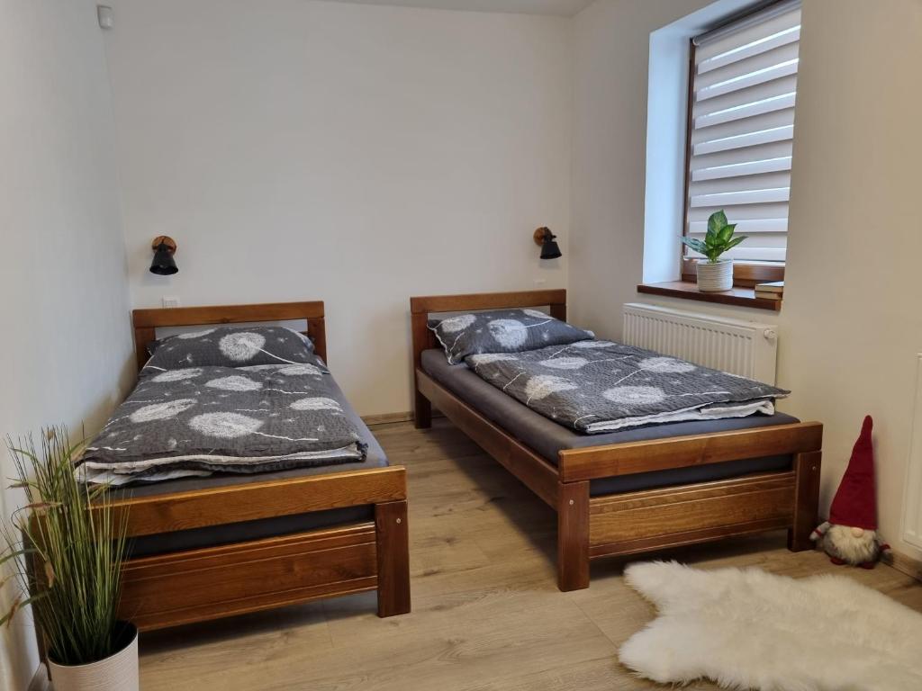 Postel nebo postele na pokoji v ubytování Apartmán Felix