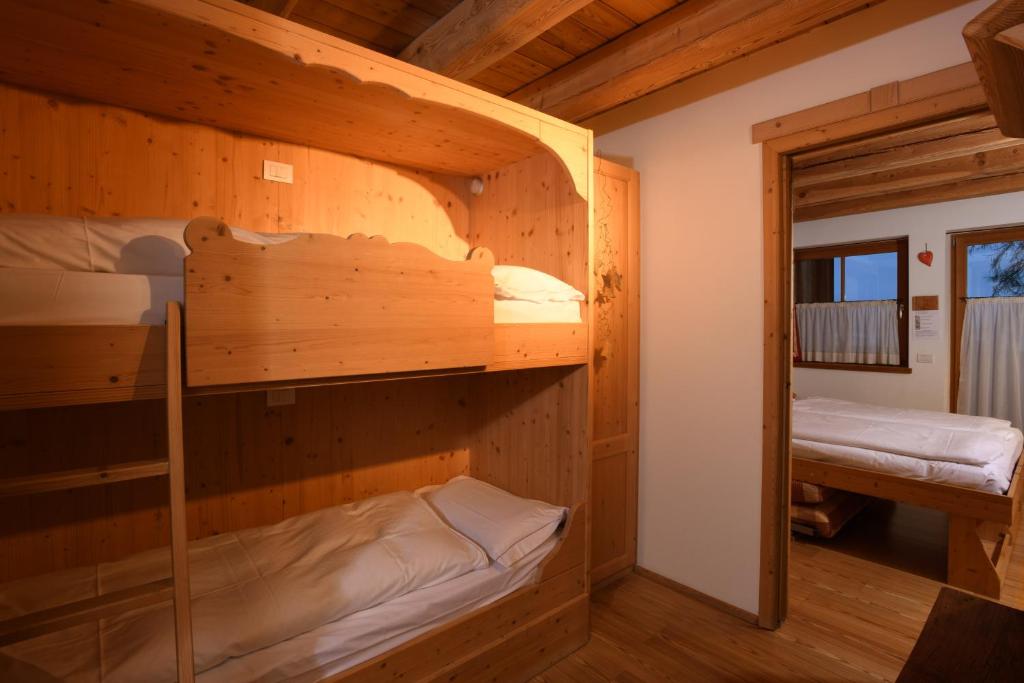Postel nebo postele na pokoji v ubytování Residence Valpiccola