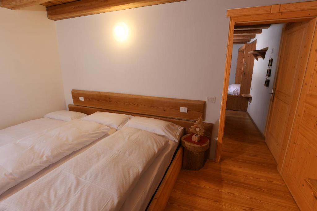Postel nebo postele na pokoji v ubytování Residence Valpiccola