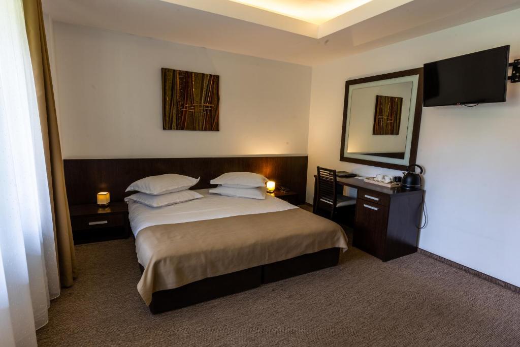 Postel nebo postele na pokoji v ubytování Hotel Smart