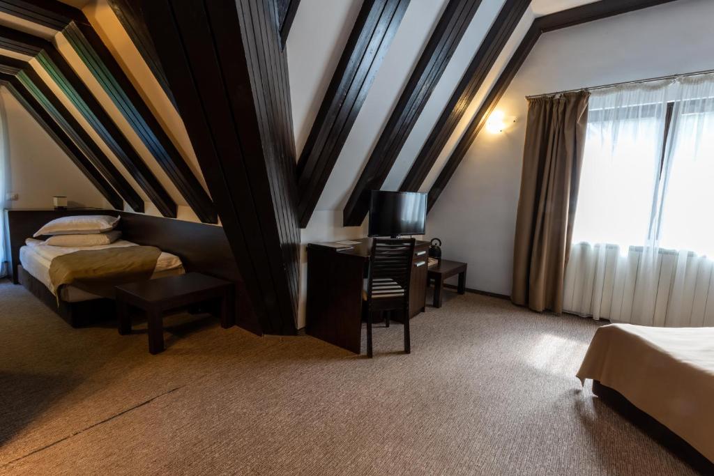 Postel nebo postele na pokoji v ubytování Hotel Smart