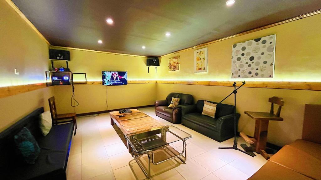 TV a/nebo společenská místnost v ubytování Piña Colina Resort