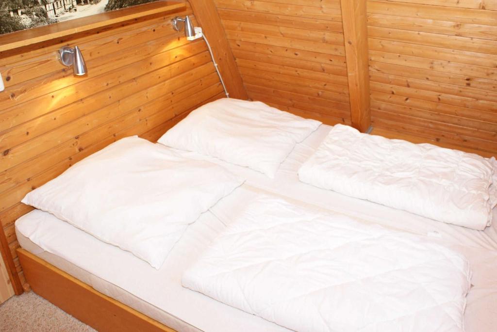 Postel nebo postele na pokoji v ubytování wenige Meter bis zum Strand