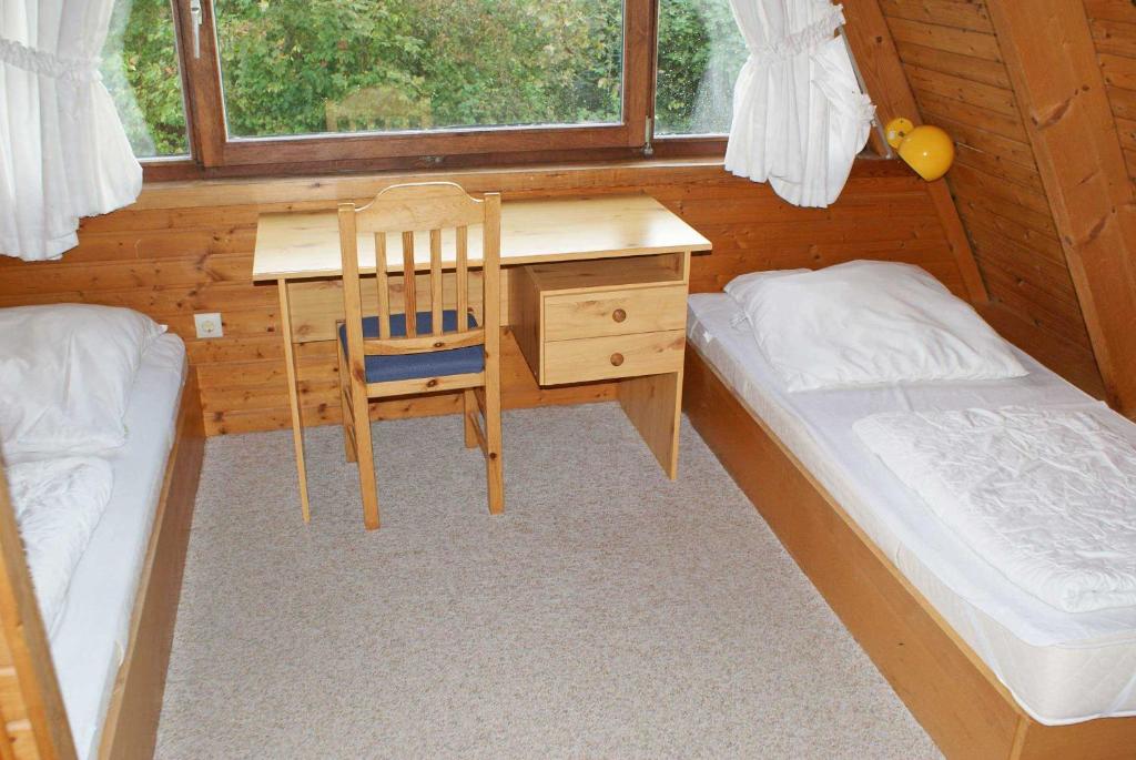 Postel nebo postele na pokoji v ubytování wenige Meter bis zum Strand