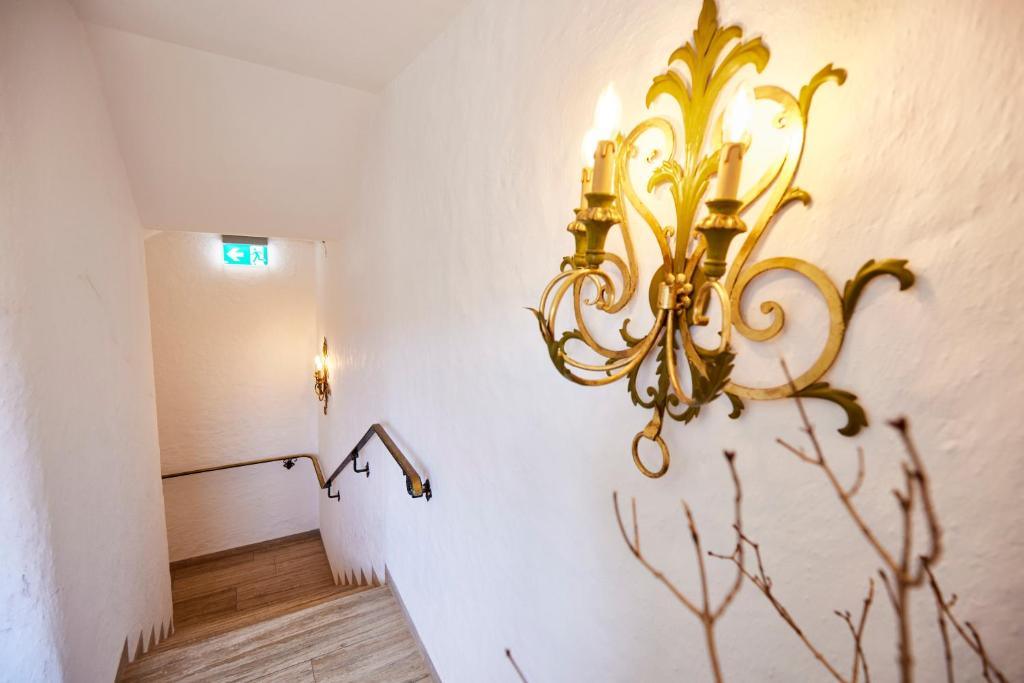 Postel nebo postele na pokoji v ubytování Sonnhof Apartments Tegernsee - zentral und perfekt für Urlaub & Arbeit