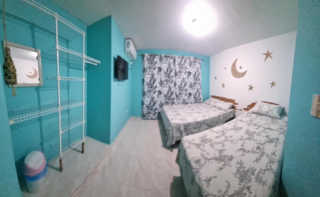 Postel nebo postele na pokoji v ubytování Casa Hostel San Andres