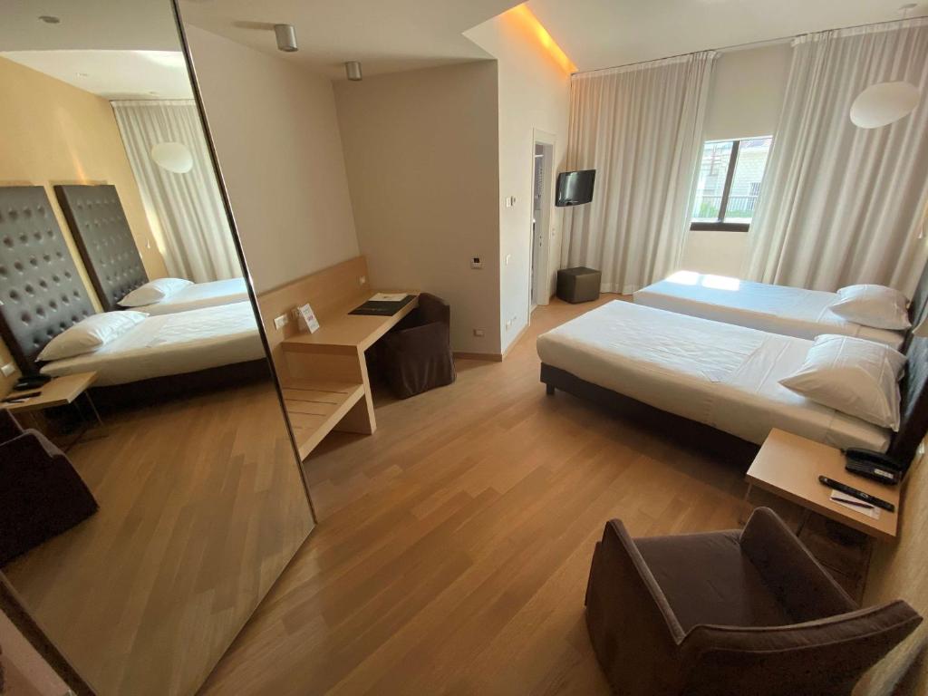 Posteľ alebo postele v izbe v ubytovaní Devero Hotel & Spa, BW Signature Collection
