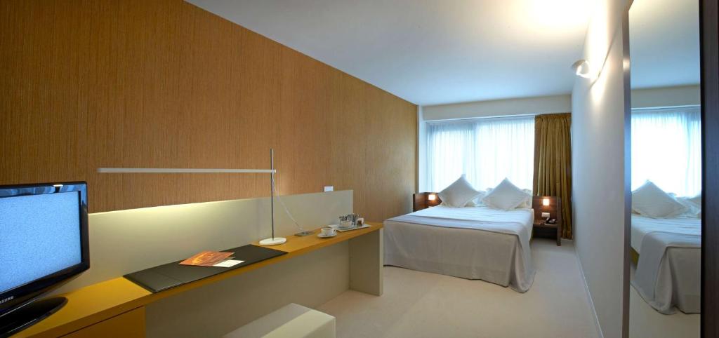 Posteľ alebo postele v izbe v ubytovaní Devero Hotel & Spa, BW Signature Collection