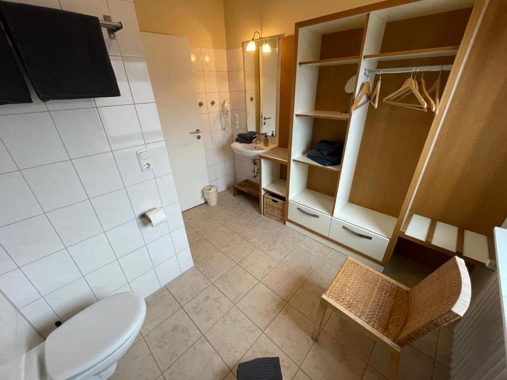 Koupelna v ubytování ApartHotel Stadtpark