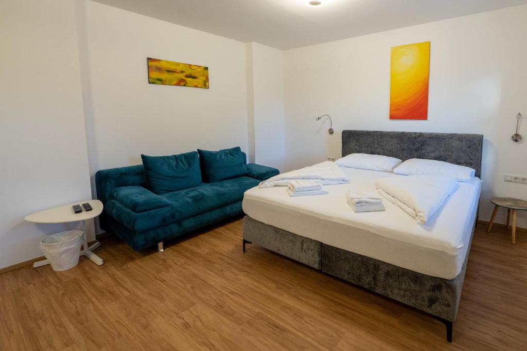Postel nebo postele na pokoji v ubytování B&B Hotel Heimgartl