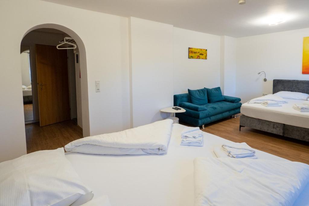 Postel nebo postele na pokoji v ubytování B&B Hotel Heimgartl
