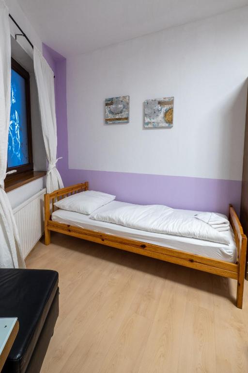 Postel nebo postele na pokoji v ubytování B&B Hotel Heimgartl