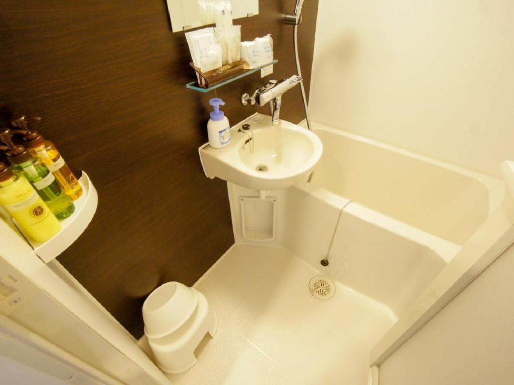 Koupelna v ubytování HOTEL LiVEMAX Yokohama Motomachi Ekimae