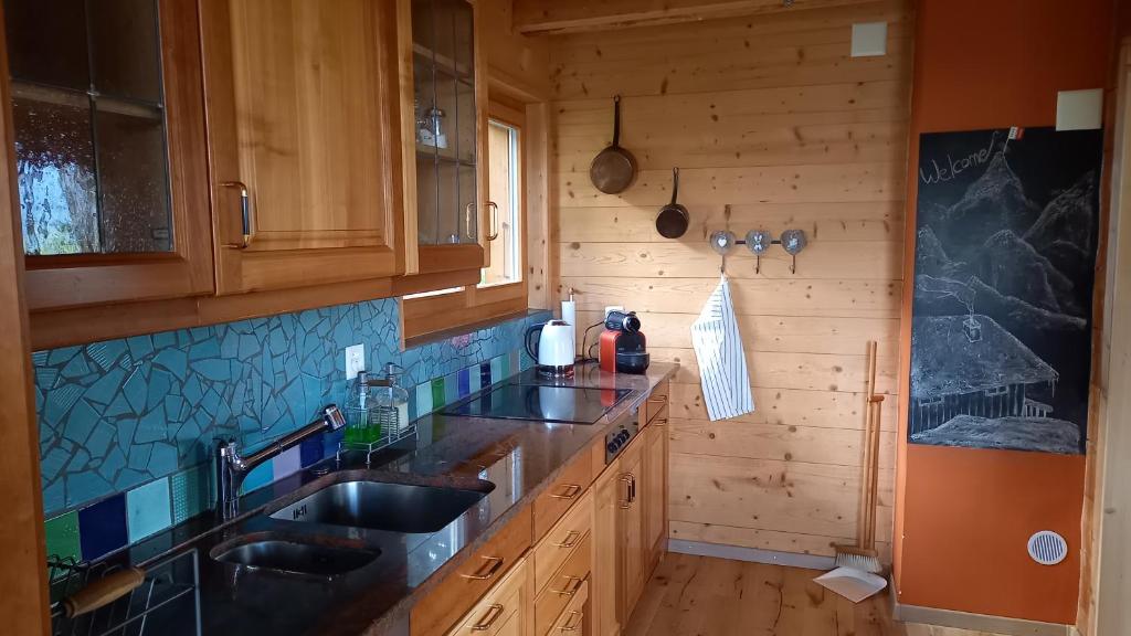Kuchyň nebo kuchyňský kout v ubytování Chalet AS des Pics