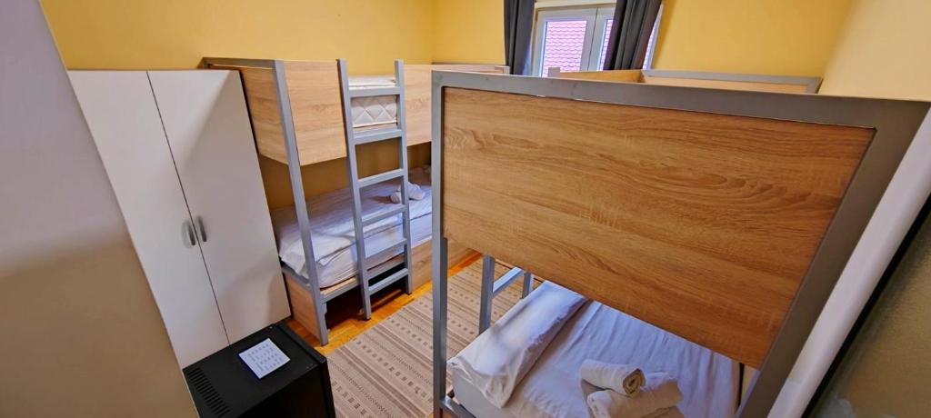 Postel nebo postele na pokoji v ubytování Villa Tower Gardos