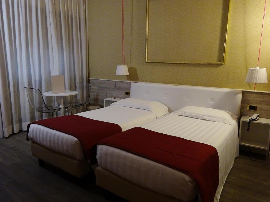 Postel nebo postele na pokoji v ubytování 7MOTEL - Settimotel
