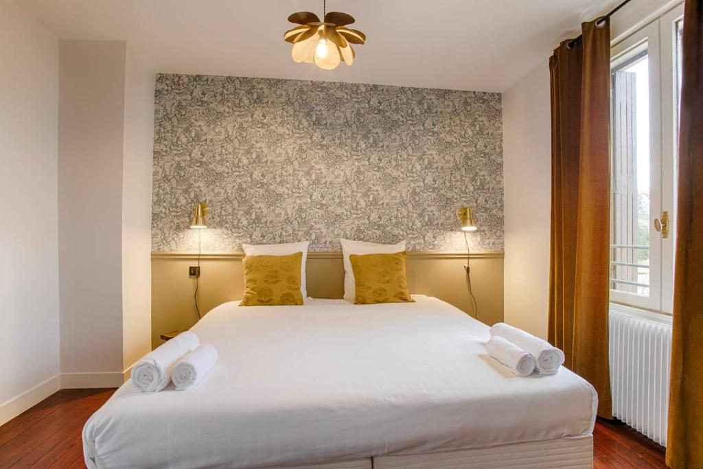 Posteľ alebo postele v izbe v ubytovaní Villa Olive - 4 Bdr - Garden - Deauville Centre
