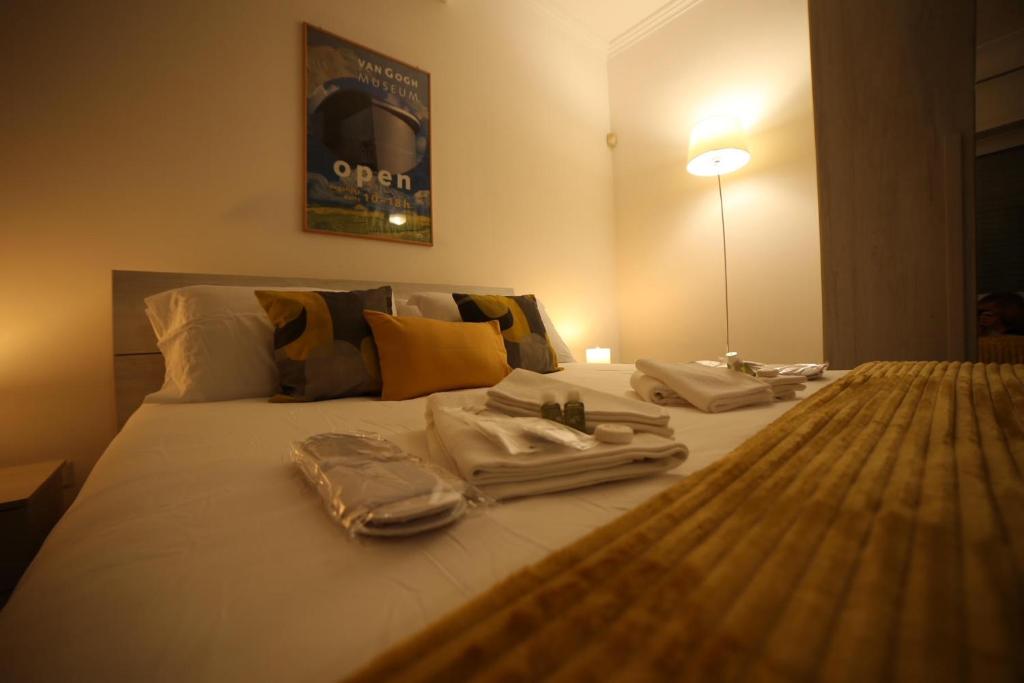 A bed or beds in a room at Appia Antica Guest House