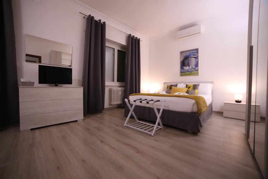 A bed or beds in a room at Appia Antica Guest House
