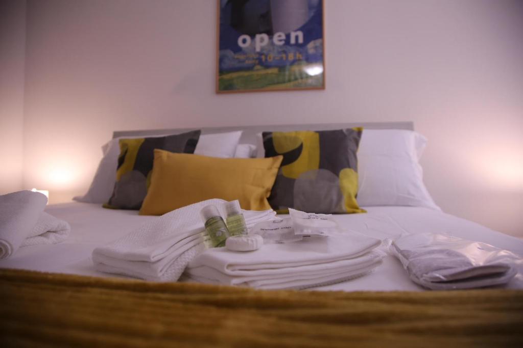 A bed or beds in a room at Appia Antica Guest House