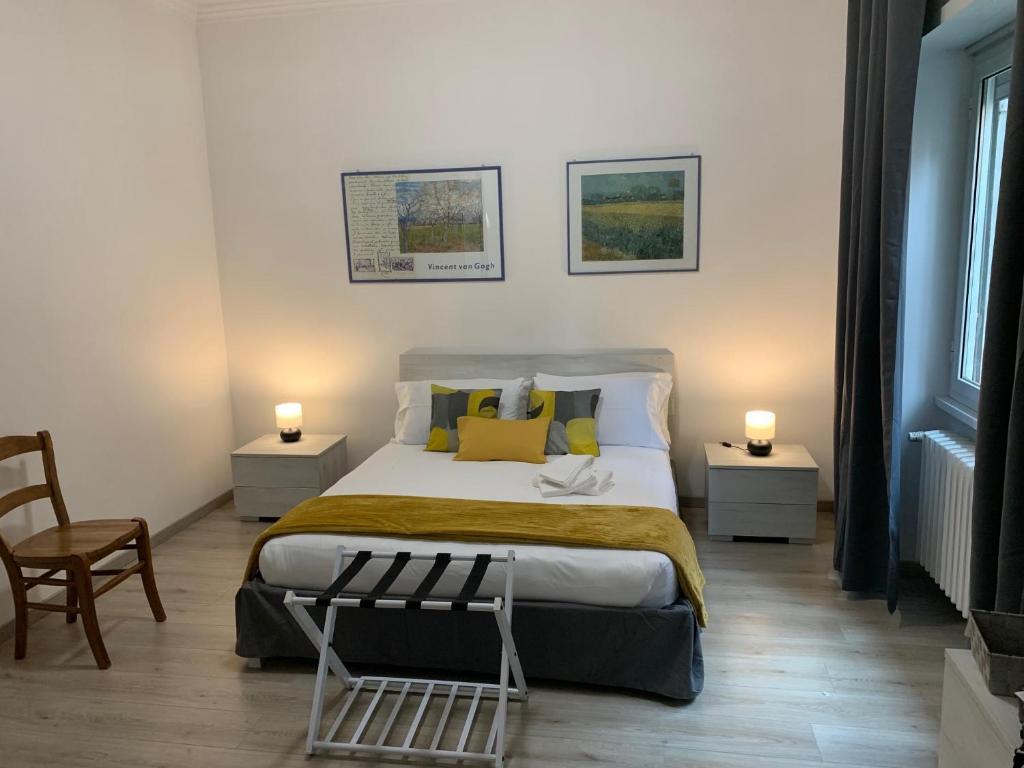 A bed or beds in a room at Appia Antica Guest House