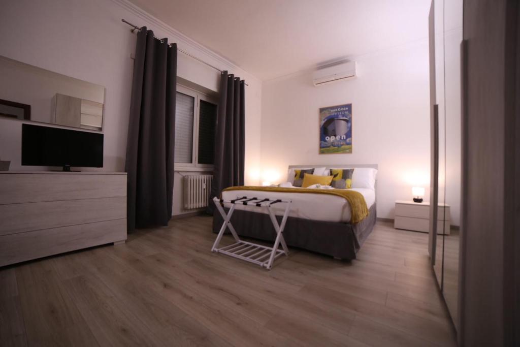 A bed or beds in a room at Appia Antica Guest House