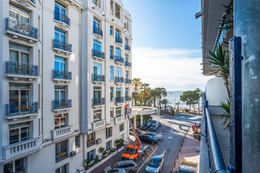 a view of a city street from a building at SERRENDY Apartment with terrace & sea view in Cannes