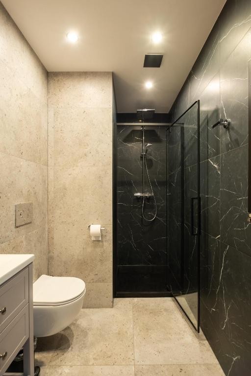 Kúpeľňa v ubytovaní Apartamenty Drewno i Ogień