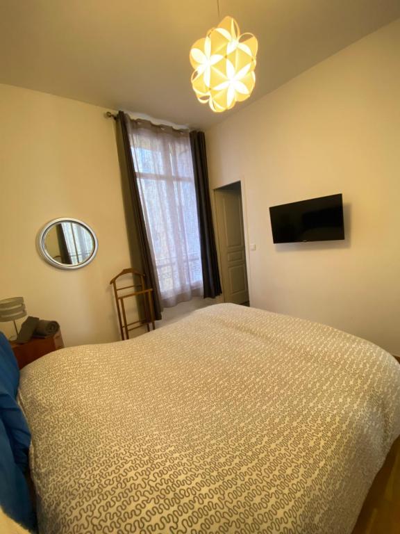 Una cama o camas en una habitaci&oacute;n de Cannes quartier Banane 3P 6 couchages