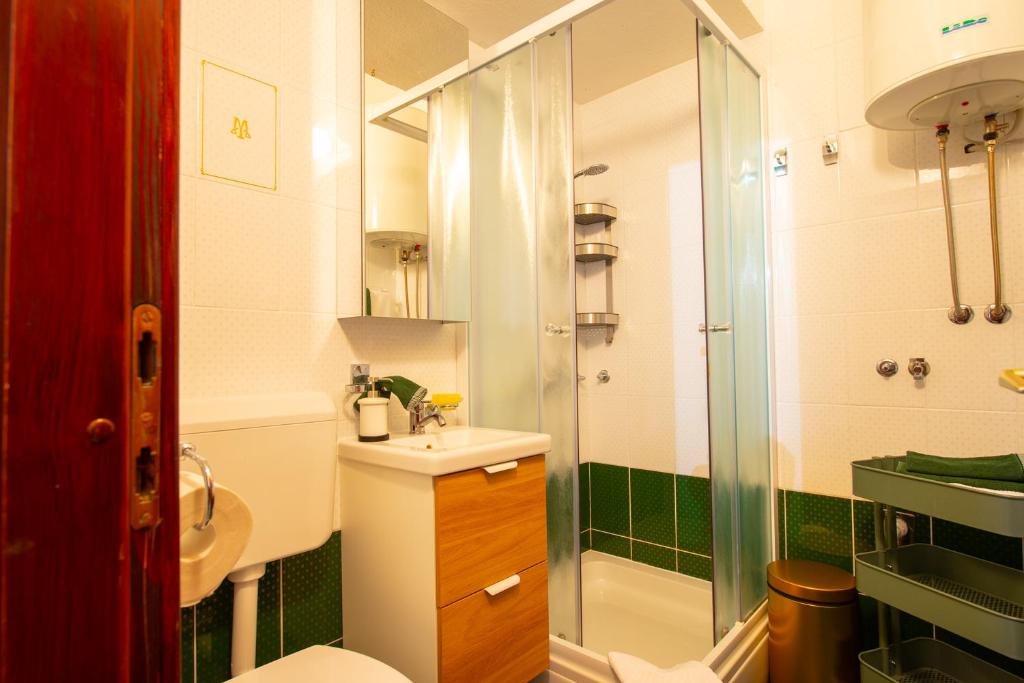 Łazienka w obiekcie Apartments Ela