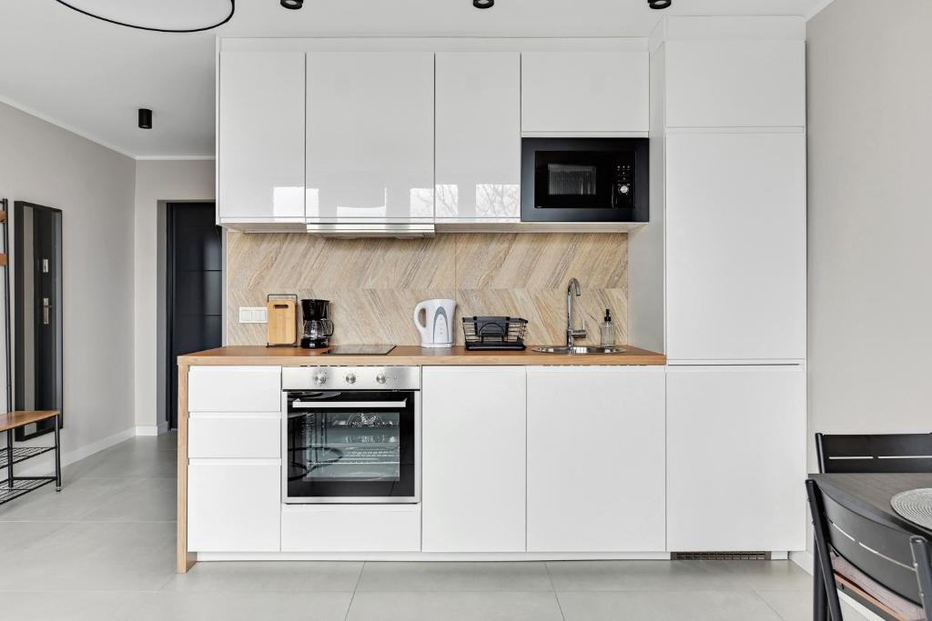 Kuchyňa alebo kuchynka v ubytovaní Comfort Apartments Morska