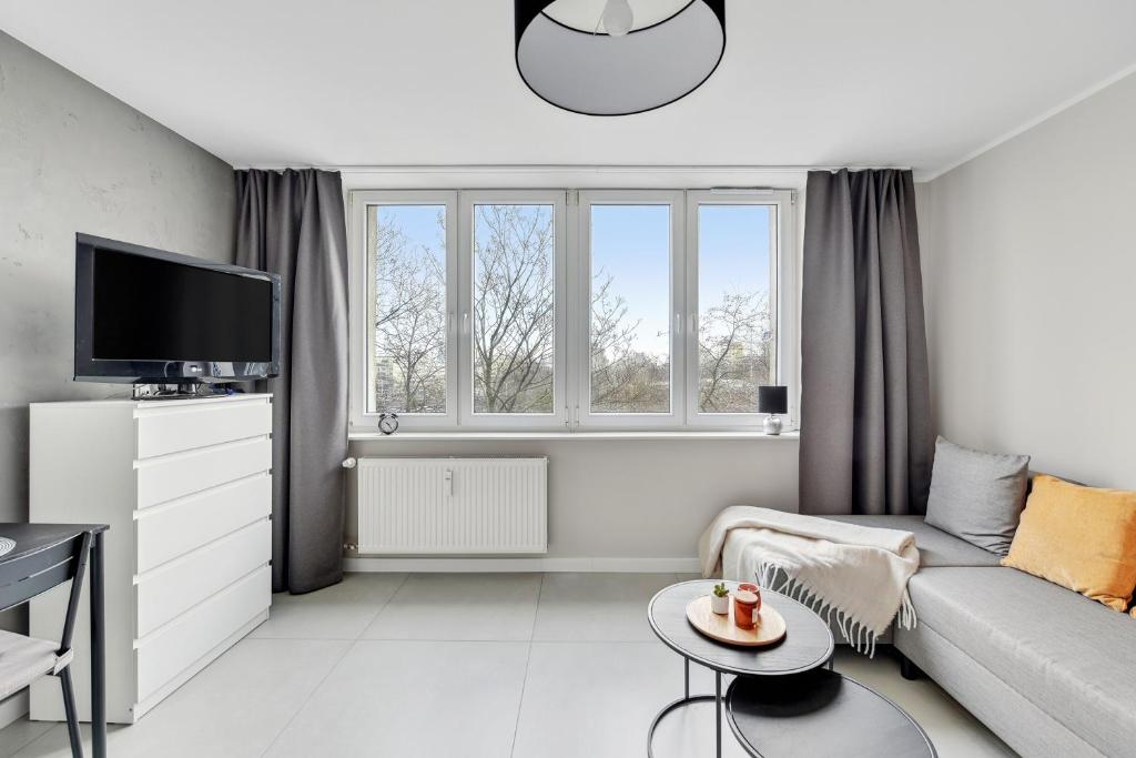 Televízia a/alebo spoločenská miestnosť v ubytovaní Comfort Apartments Morska
