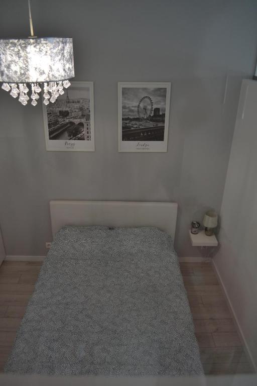 Posteľ alebo postele v izbe v ubytovaní Exclusive Loft Tymienieckiego street