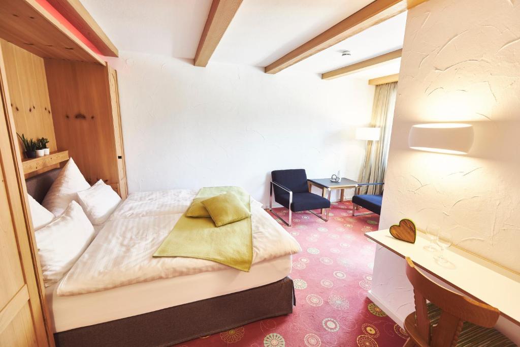 Postel nebo postele na pokoji v ubytování Sonnhof Apartments Tegernsee - zentral und perfekt für Urlaub & Arbeit