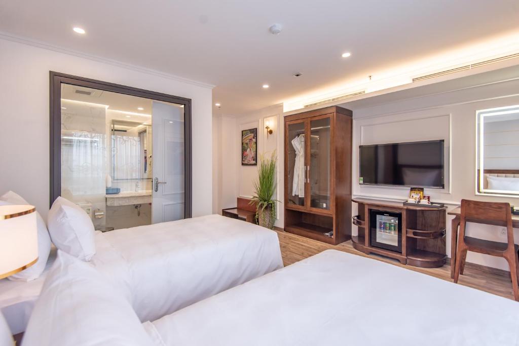 Postel nebo postele na pokoji v ubytování Reyna Luxury Hotel & Spa