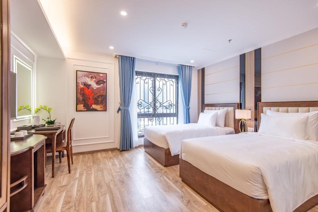 Postel nebo postele na pokoji v ubytování Reyna Luxury Hotel & Spa