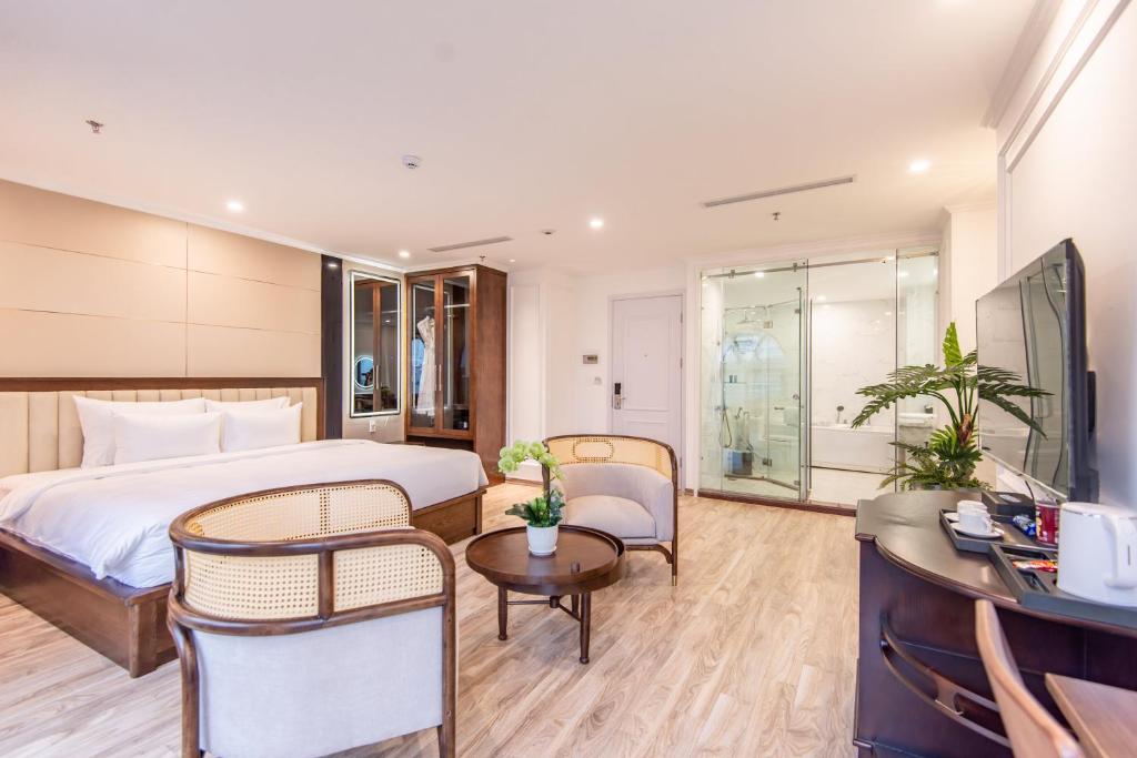 TV a/nebo společenská místnost v ubytování Reyna Luxury Hotel & Spa