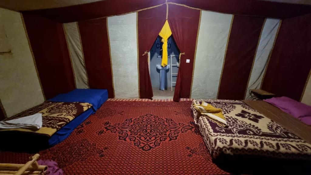 Letto o letti in una camera di Chigaga Luxury Camp