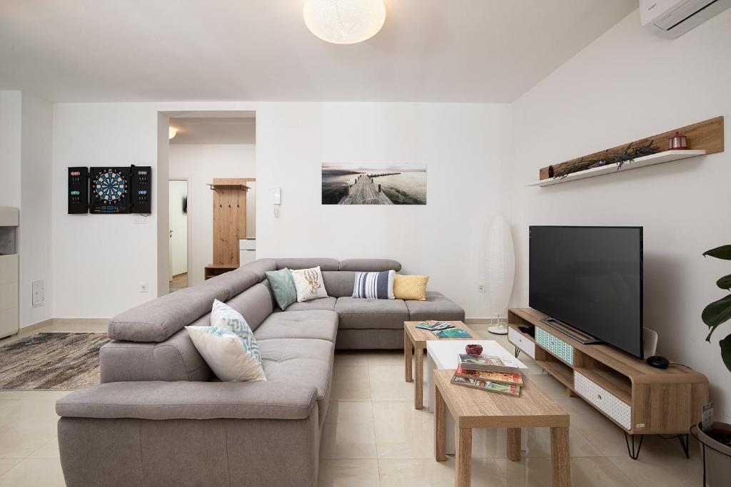 Telewizja i/lub zestaw kina domowego w obiekcie Apartment J&E