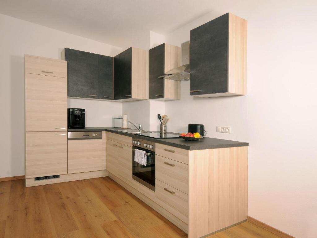Kuchyň nebo kuchyňský kout v ubytování Apartment Wanglblick by Interhome