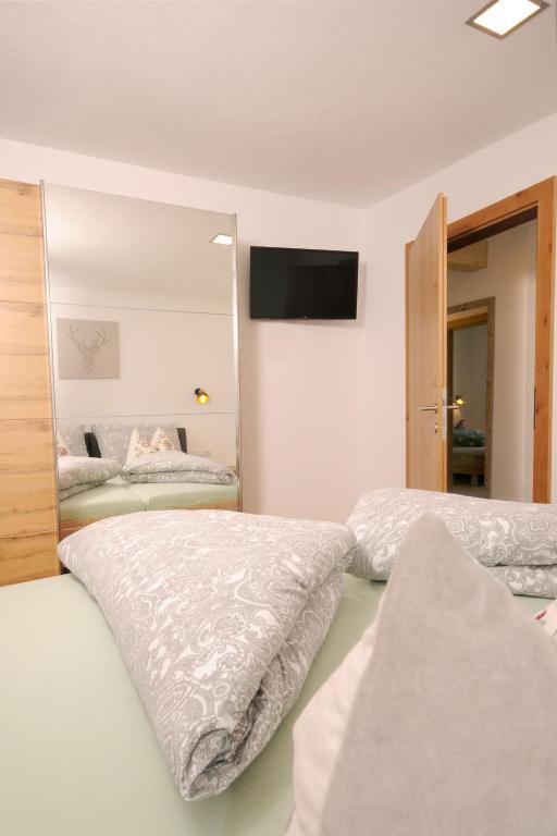 Postel nebo postele na pokoji v ubytování Apartment Wanglblick by Interhome