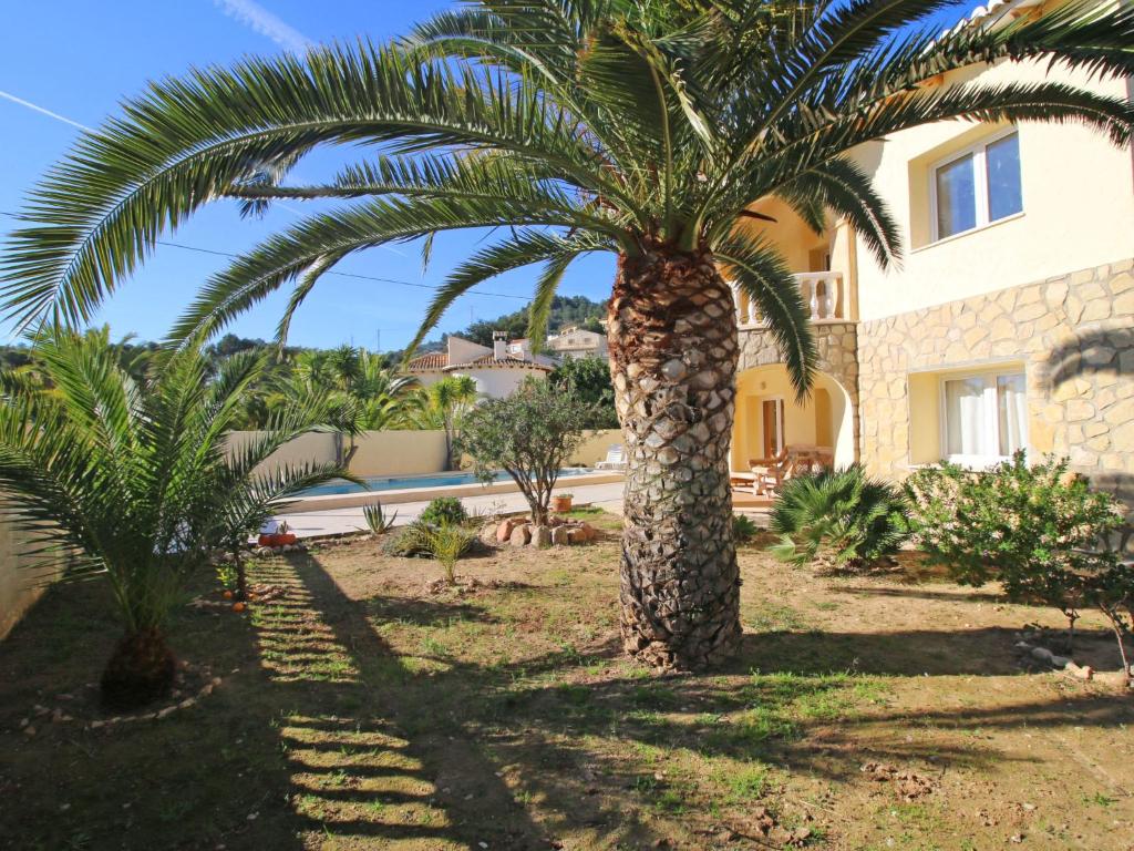 A garden outside Holiday Home Cucarres by Interhome