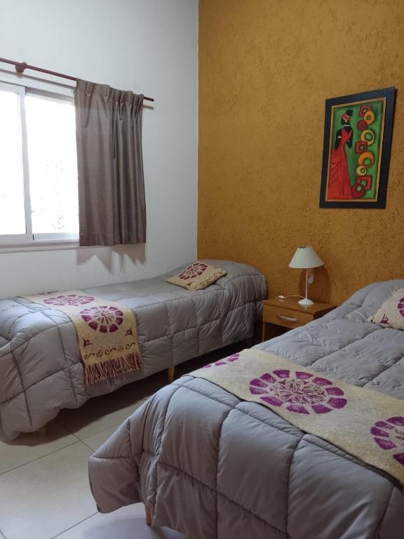Postel nebo postele na pokoji v ubytování Departamento duplex