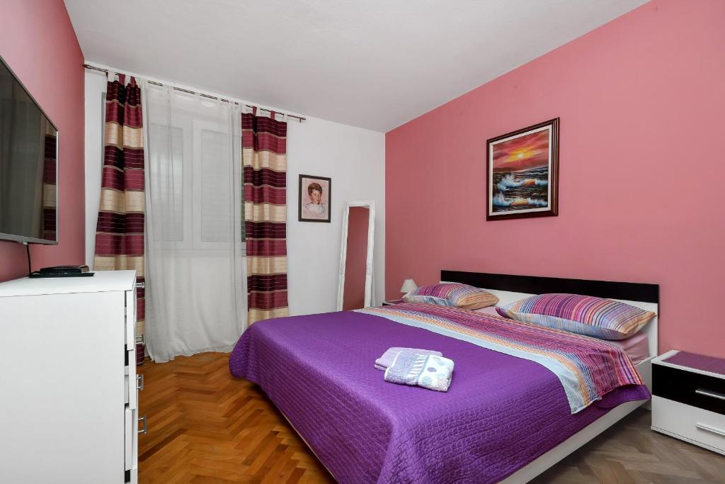Posteľ alebo postele v izbe v ubytovaní Apartman Goranka