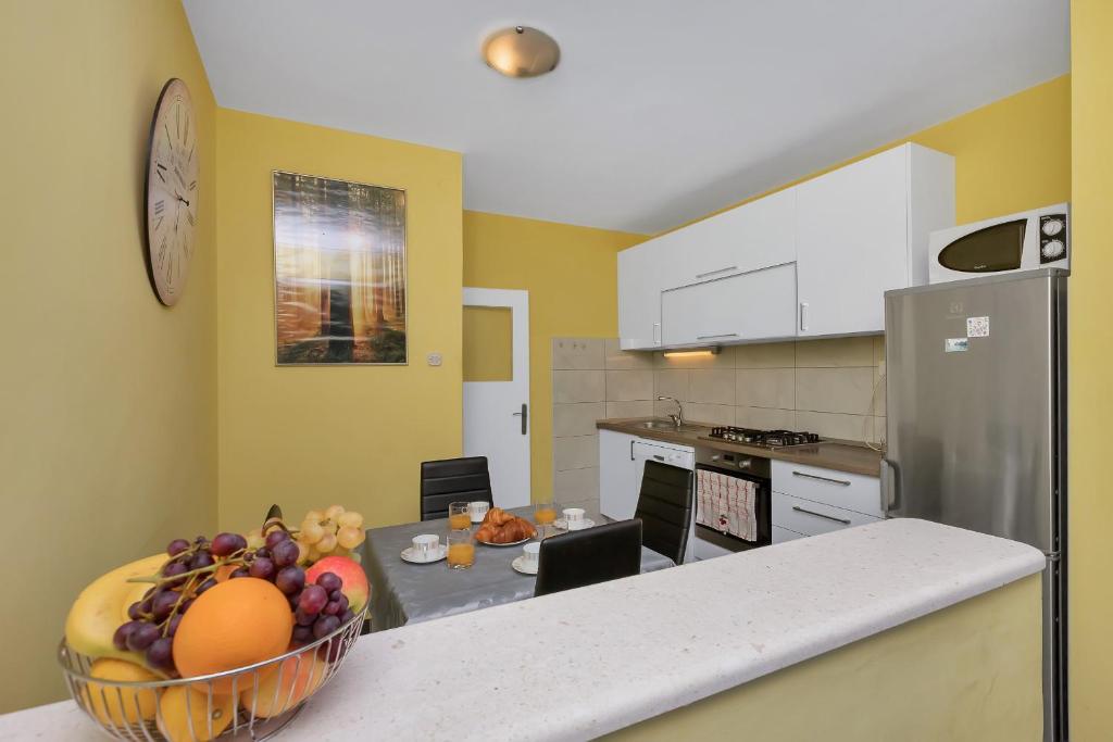 Kuchyňa alebo kuchynka v ubytovaní Apartman Goranka