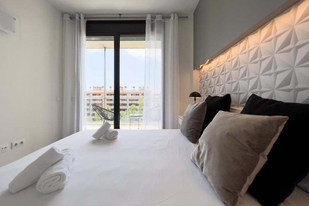 Posteľ alebo postele v izbe v ubytovaní chicStays Apartment Ciutadella Park