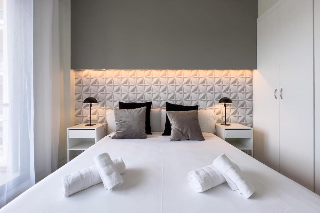 Posteľ alebo postele v izbe v ubytovaní chicStays Apartment Ciutadella Park