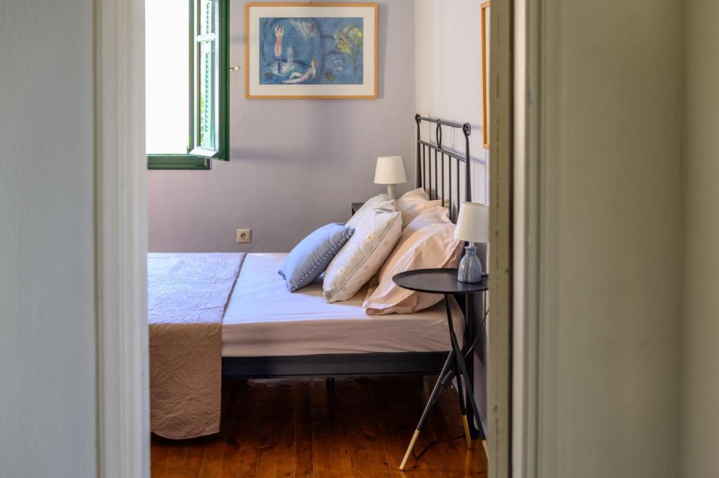 Łóżko lub łóżka w pokoju w obiekcie Casa di Pupa