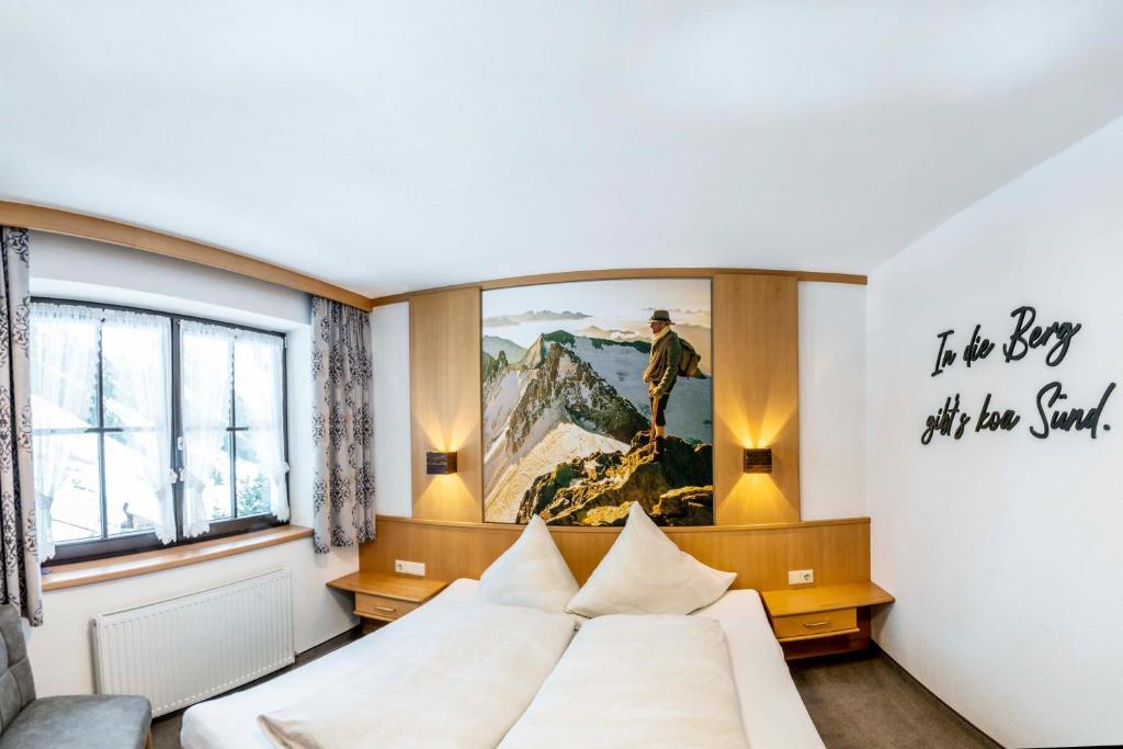 Postel nebo postele na pokoji v ubytování Almhof-Reithof Pitztal